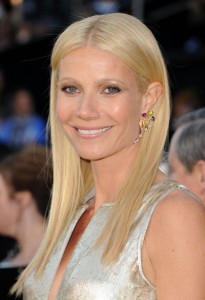 Gwyneth Paltrow Oscars-2011 Red Carpet-Gwyneth Paltrow wore colorful statement earrings by Louis Vuitton.